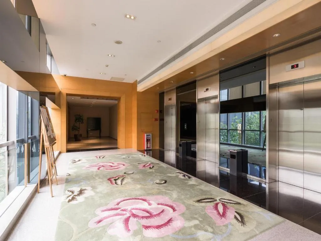 Bed in Guangzhou Carat Hotel