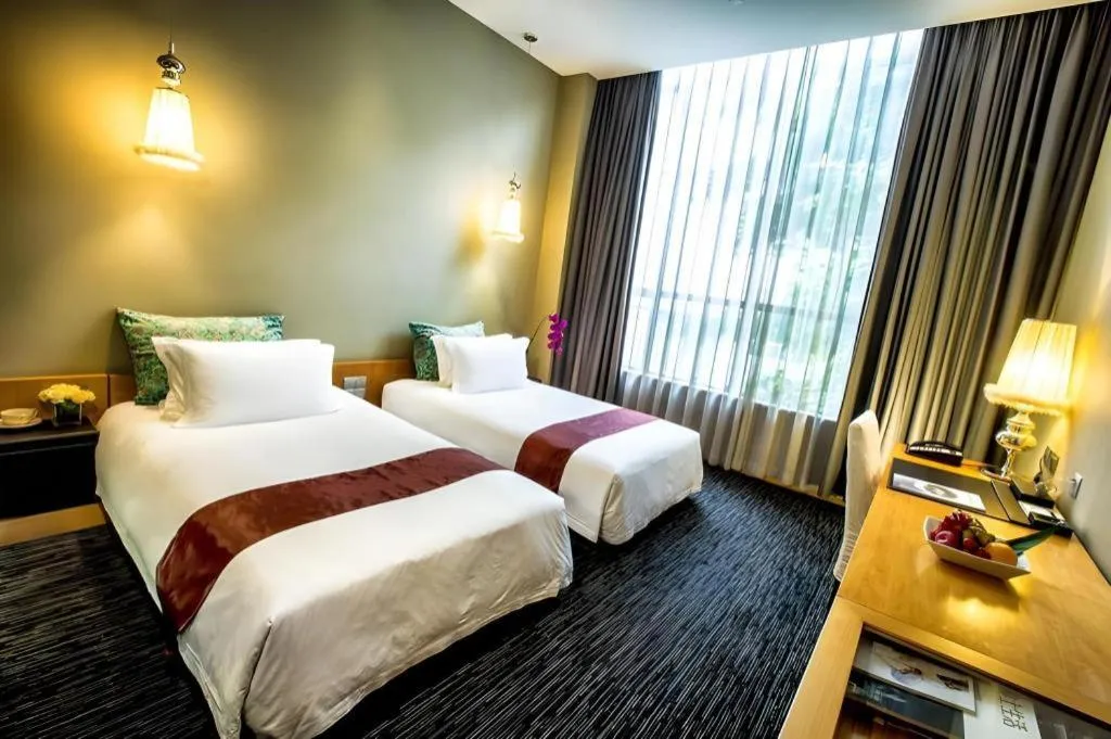 Bed in Guangzhou Carat Hotel