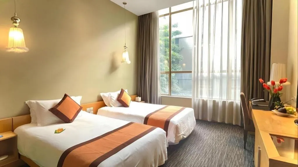 Bed in Guangzhou Carat Hotel