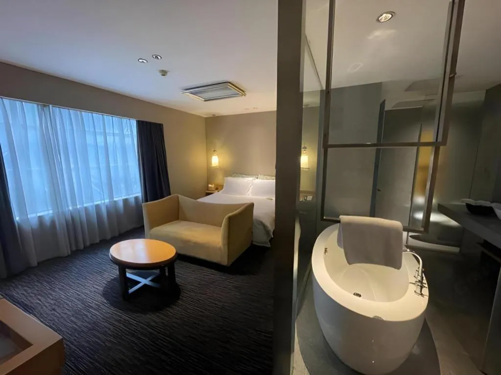 Bed in Guangzhou Carat Hotel