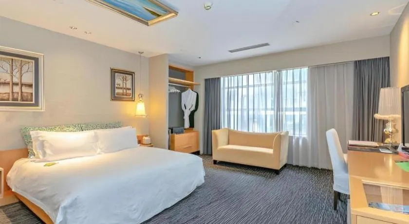 Bed in Guangzhou Carat Hotel