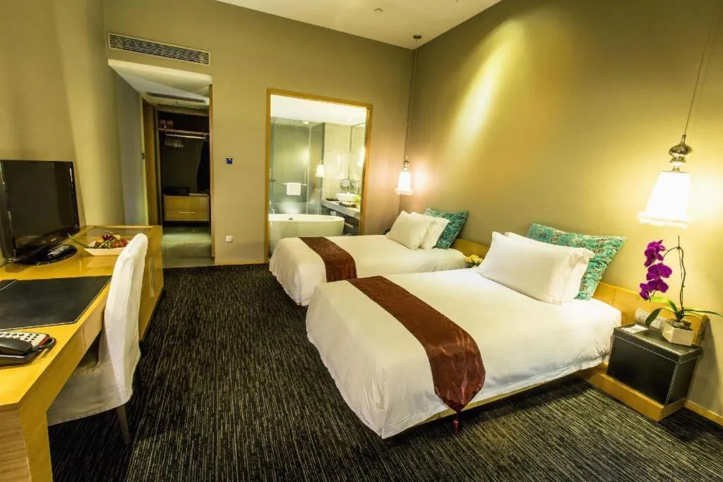 Bed in Guangzhou Carat Hotel