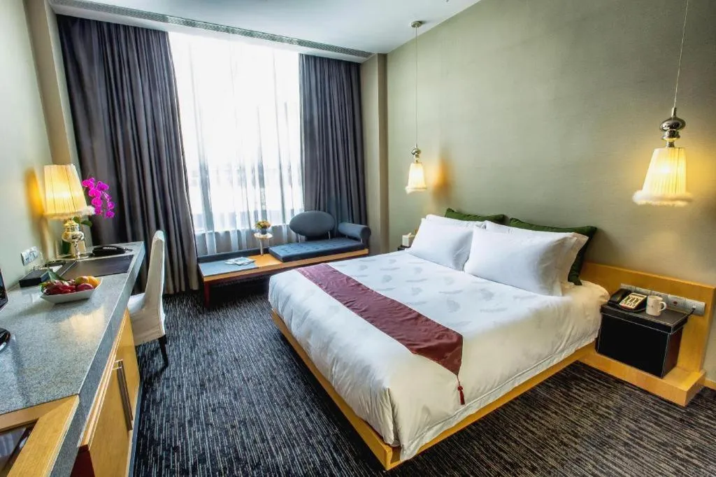 Bed in Guangzhou Carat Hotel