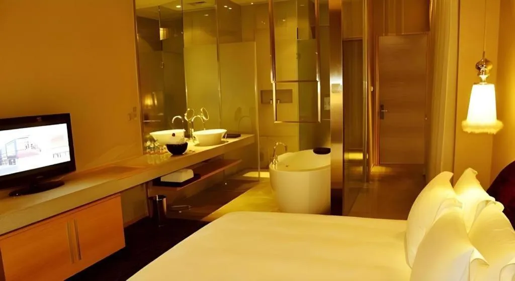 Bed in Guangzhou Carat Hotel