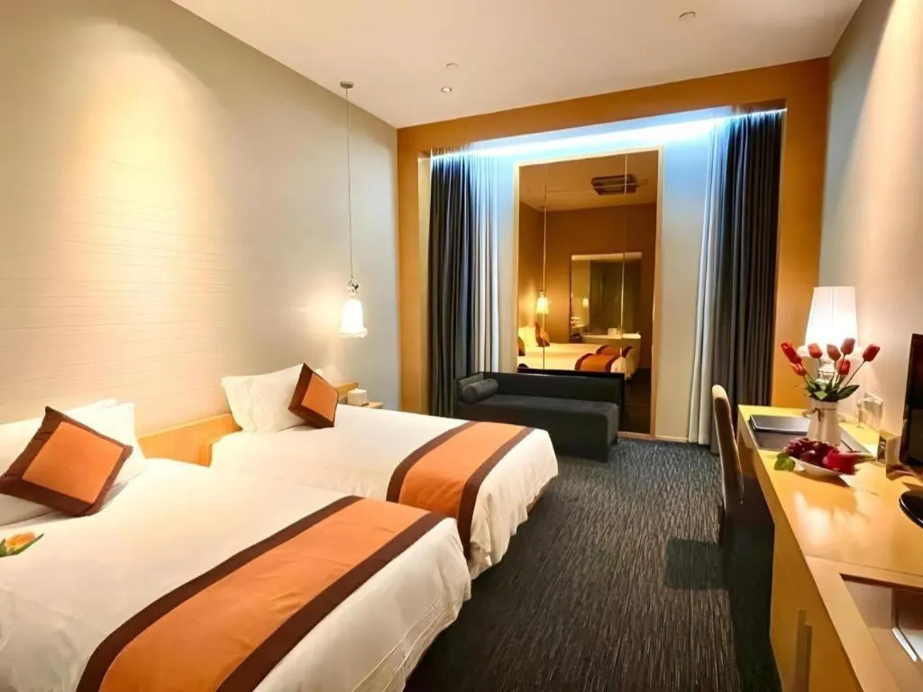 Bed in Guangzhou Carat Hotel