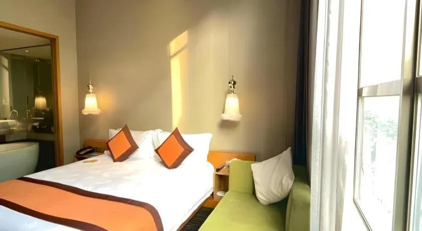 Bed in Guangzhou Carat Hotel