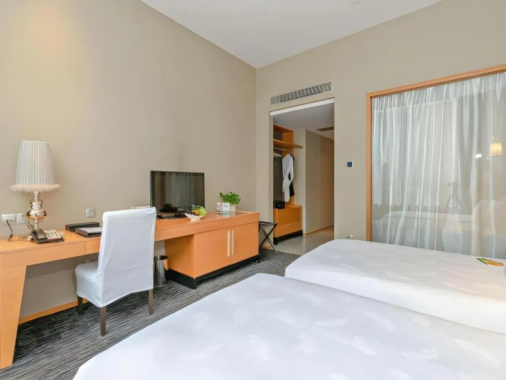 Bed in Guangzhou Carat Hotel