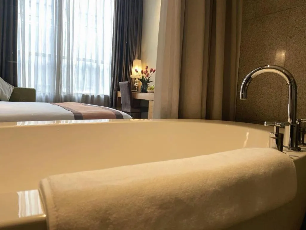 Bed in Guangzhou Carat Hotel