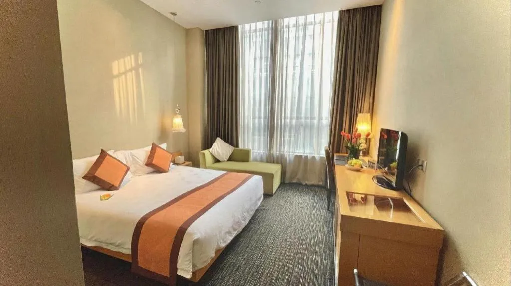 Bed in Guangzhou Carat Hotel