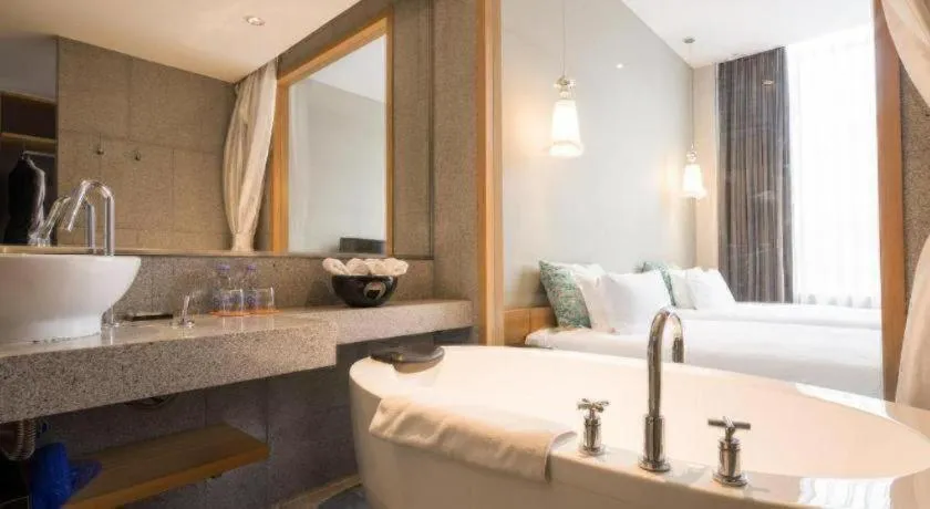 Bed in Guangzhou Carat Hotel