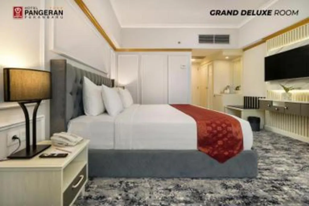 Bed in Hotel Pangeran