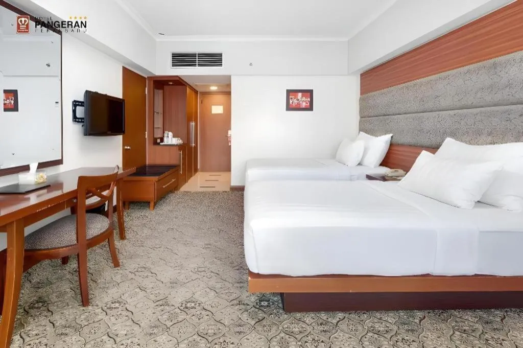 Bed in Hotel Pangeran