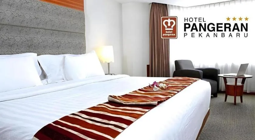 Bed in Hotel Pangeran