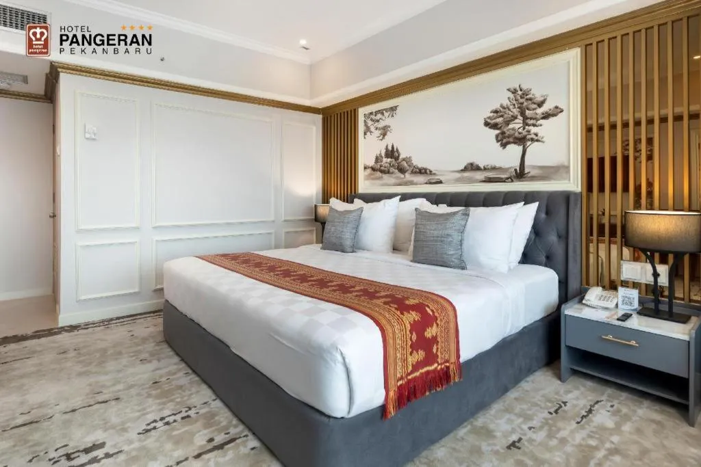 Bed in Hotel Pangeran