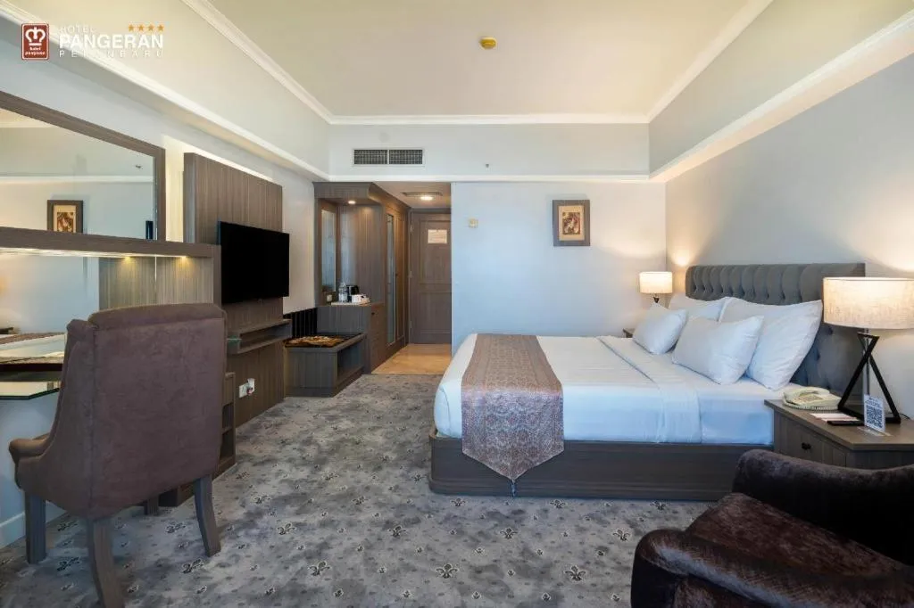 Bed in Hotel Pangeran