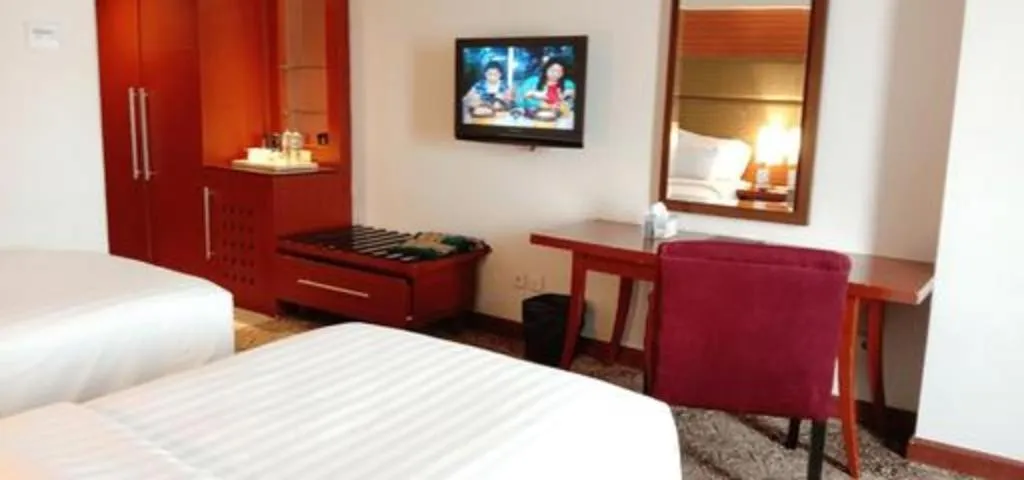 Bed in Hotel Pangeran