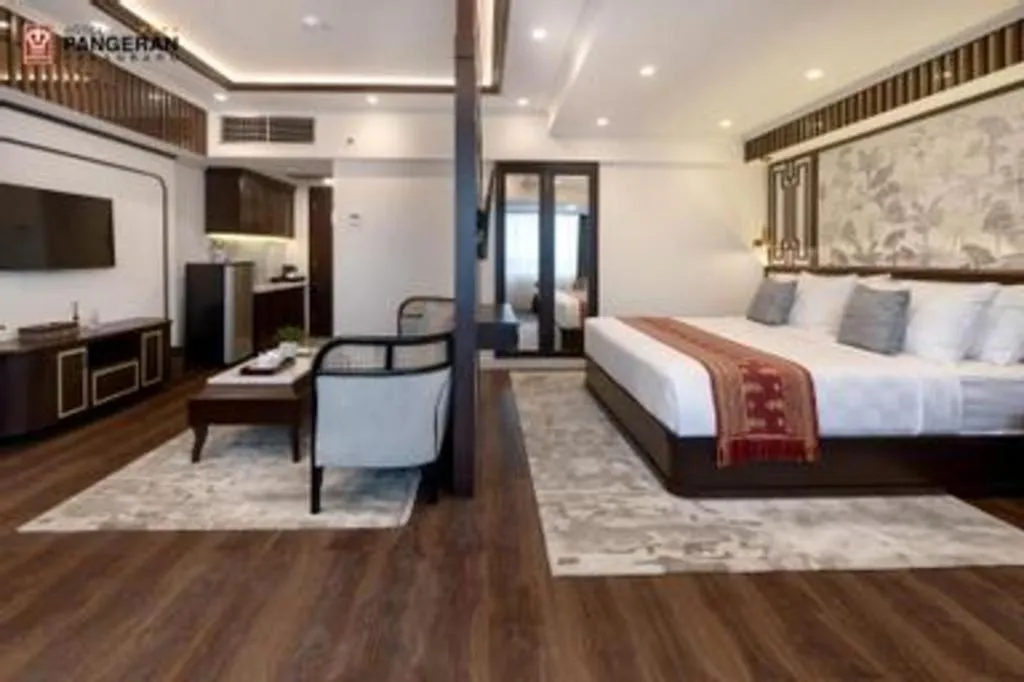 Bed in Hotel Pangeran