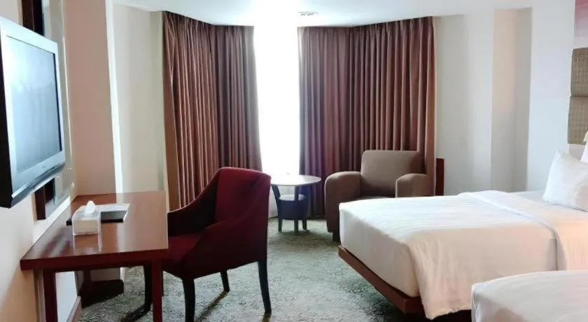 Bed in Hotel Pangeran