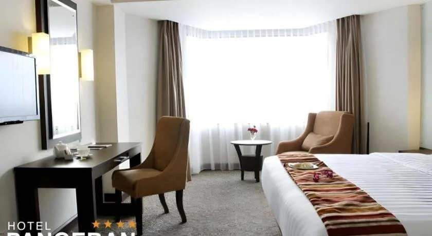 Bed in Hotel Pangeran