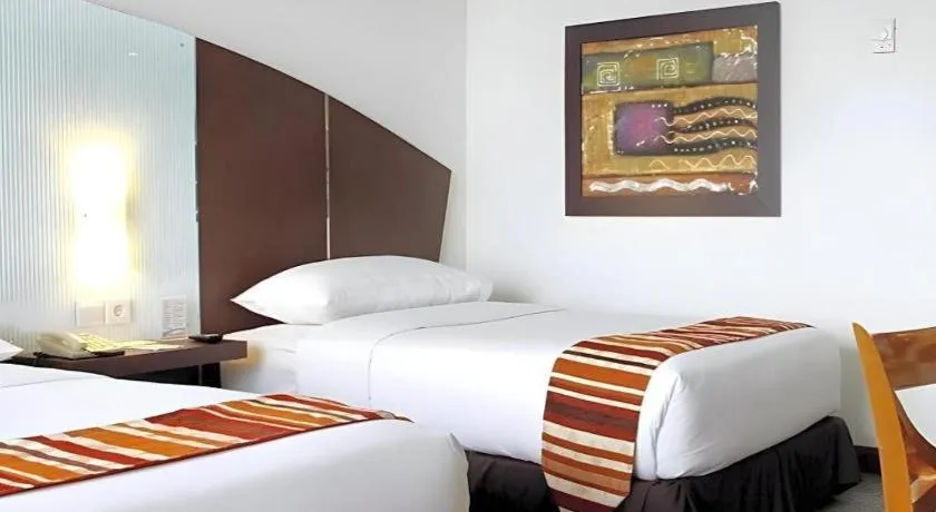 Bed in Hotel Pangeran