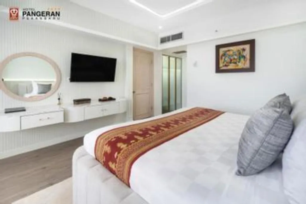 Bed in Hotel Pangeran