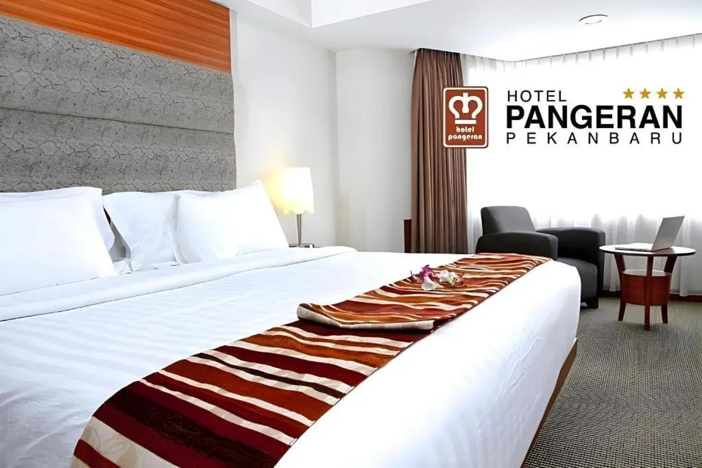 Bed in Hotel Pangeran