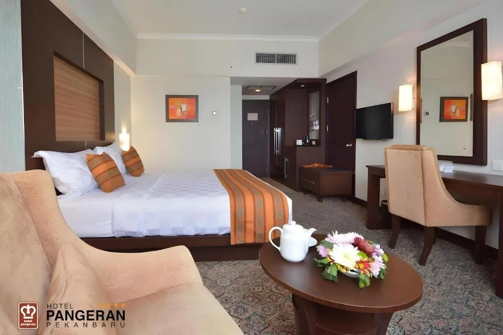 Bed in Hotel Pangeran