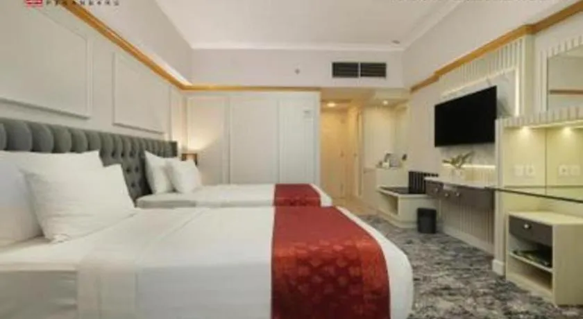 Bed in Hotel Pangeran