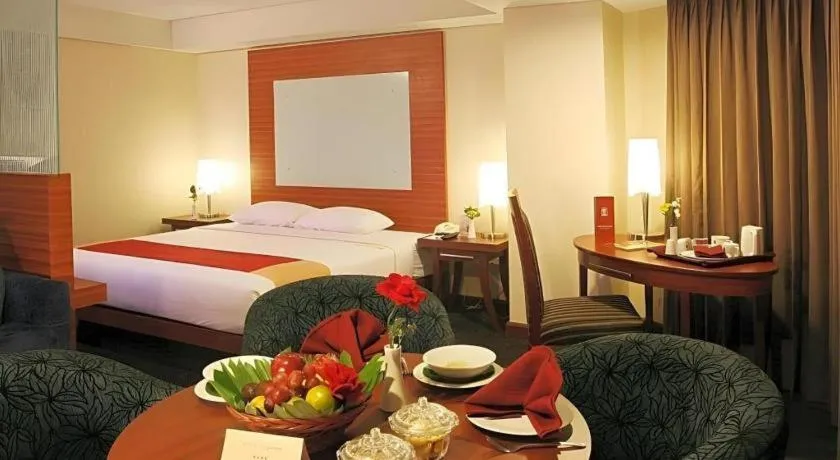 Bed in Hotel Pangeran