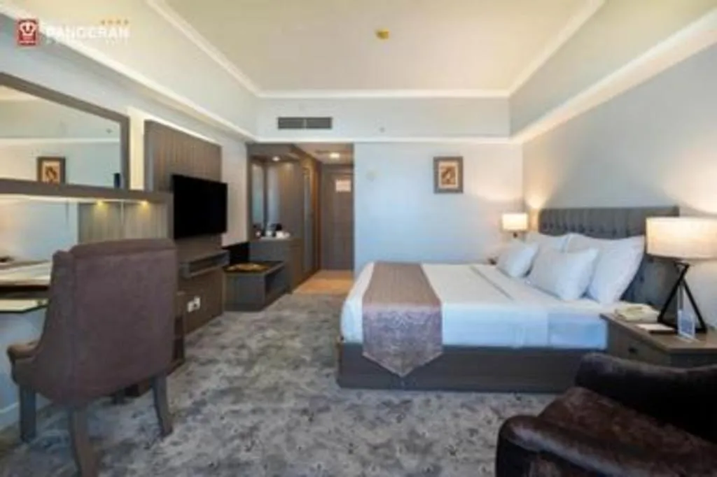 Bed in Hotel Pangeran