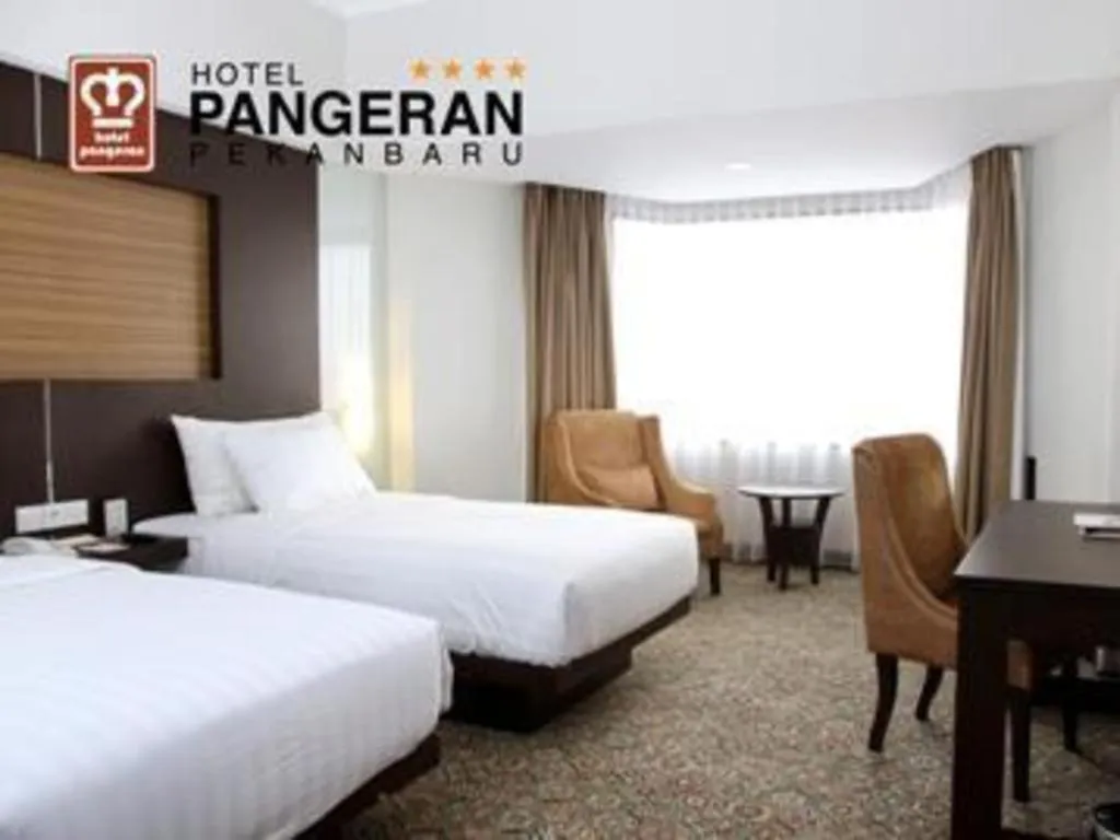 Bed in Hotel Pangeran