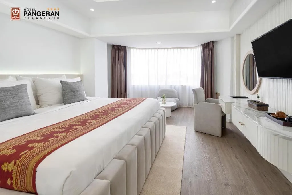 Bed in Hotel Pangeran