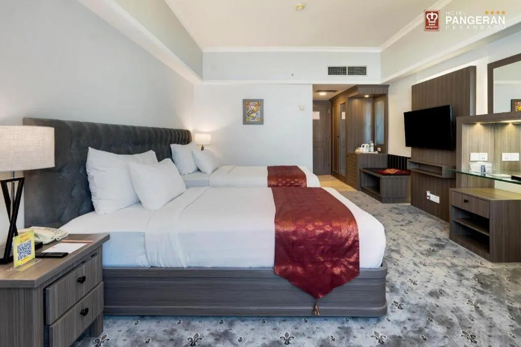 Bed in Hotel Pangeran