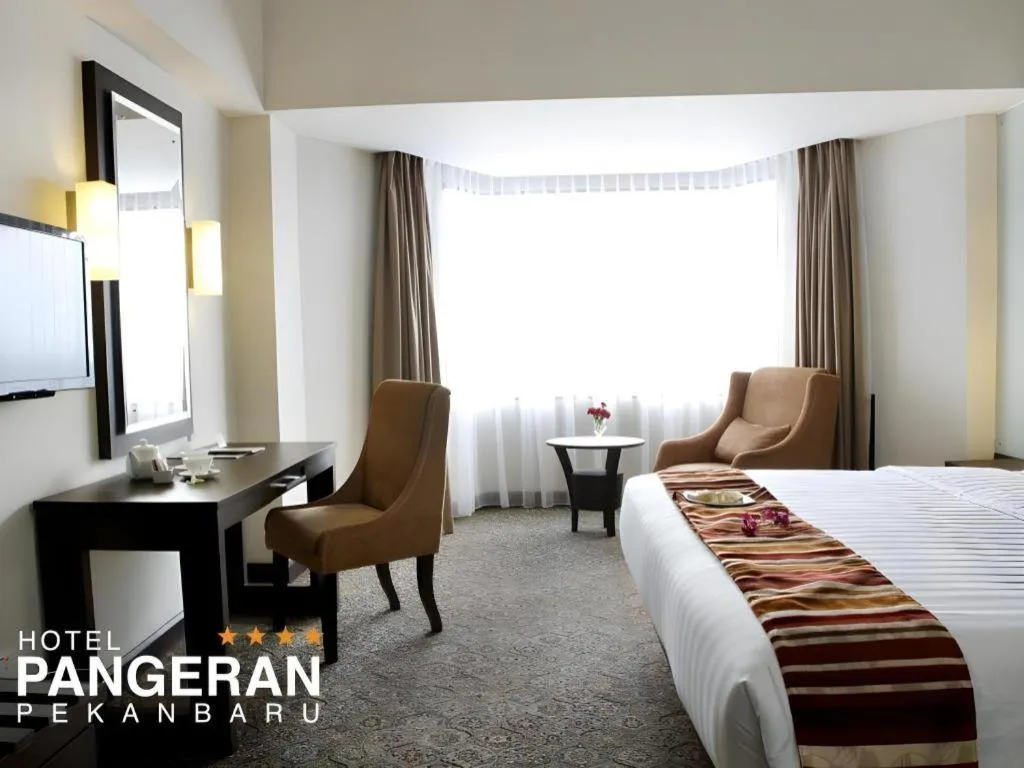 Bed in Hotel Pangeran