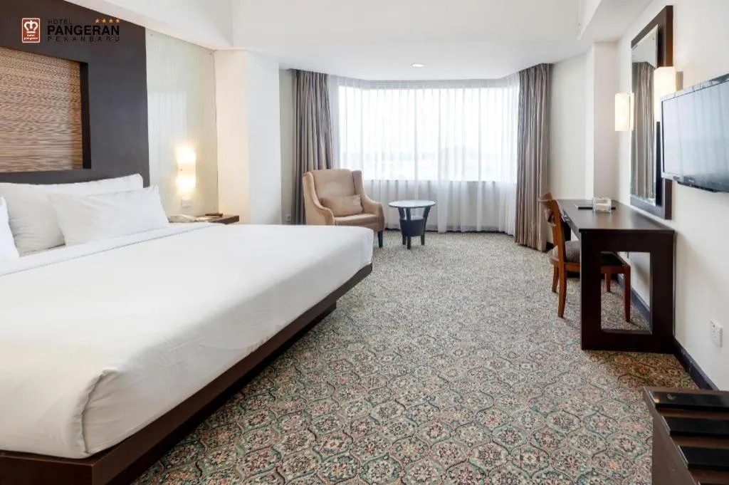 Bed in Hotel Pangeran