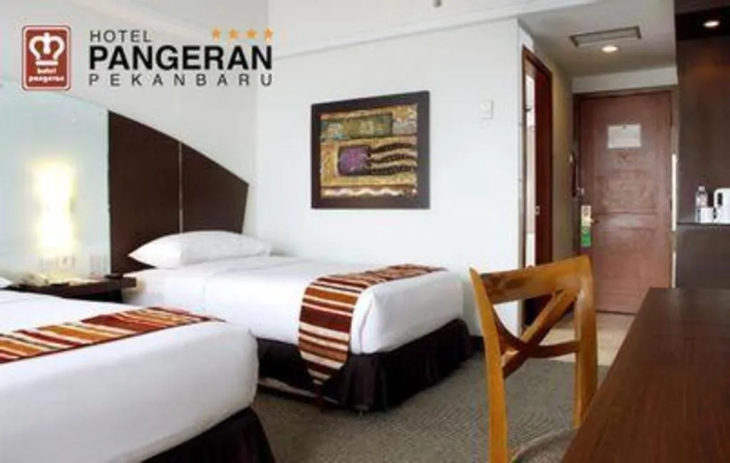 Bed in Hotel Pangeran