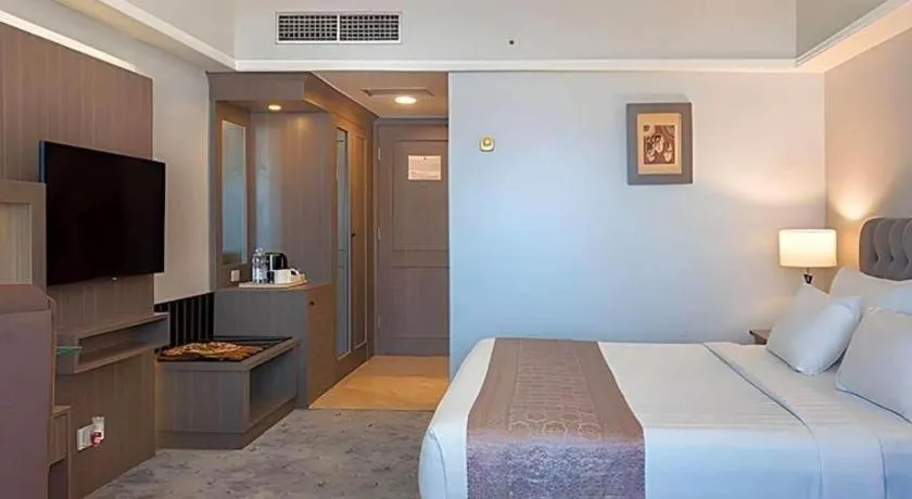 Bed in Hotel Pangeran