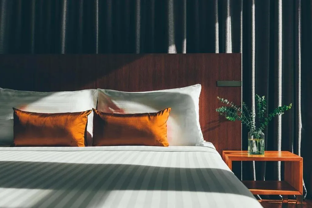 Bed in Seven Zea Chic Hotel