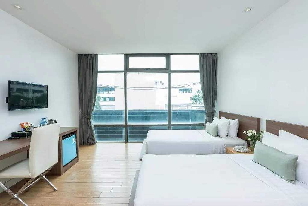 Bed in Seven Zea Chic Hotel