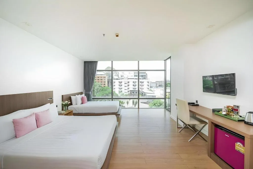 Bed in Seven Zea Chic Hotel