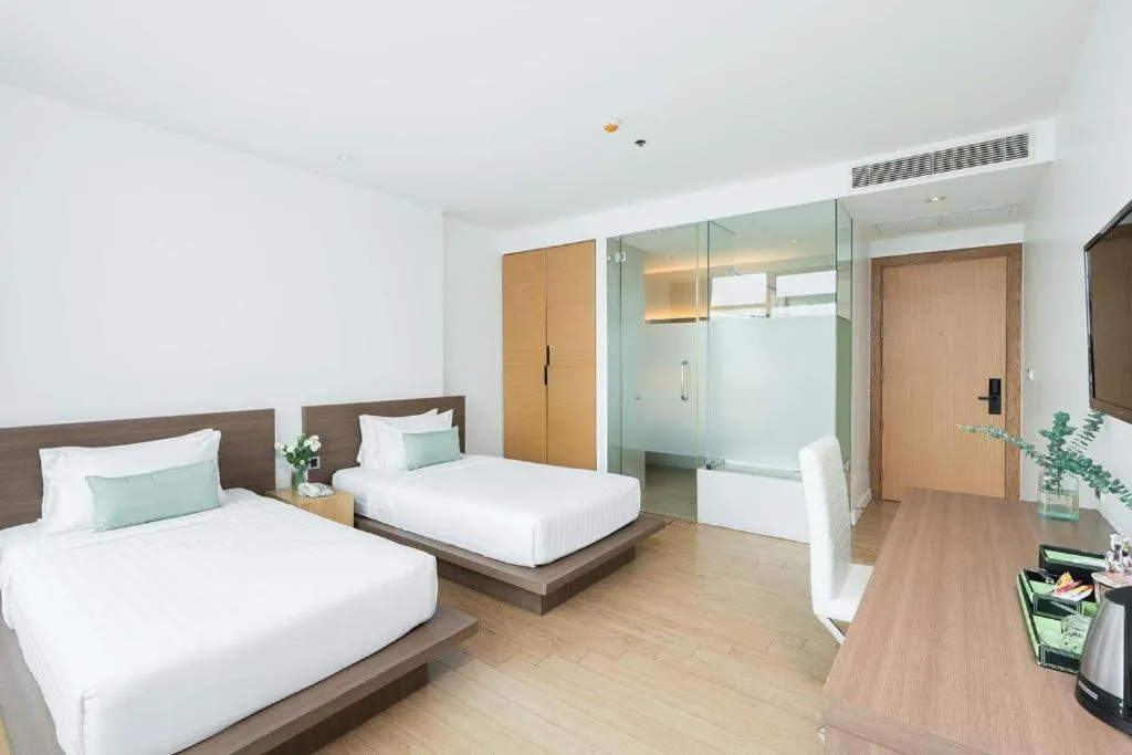 Bed in Seven Zea Chic Hotel