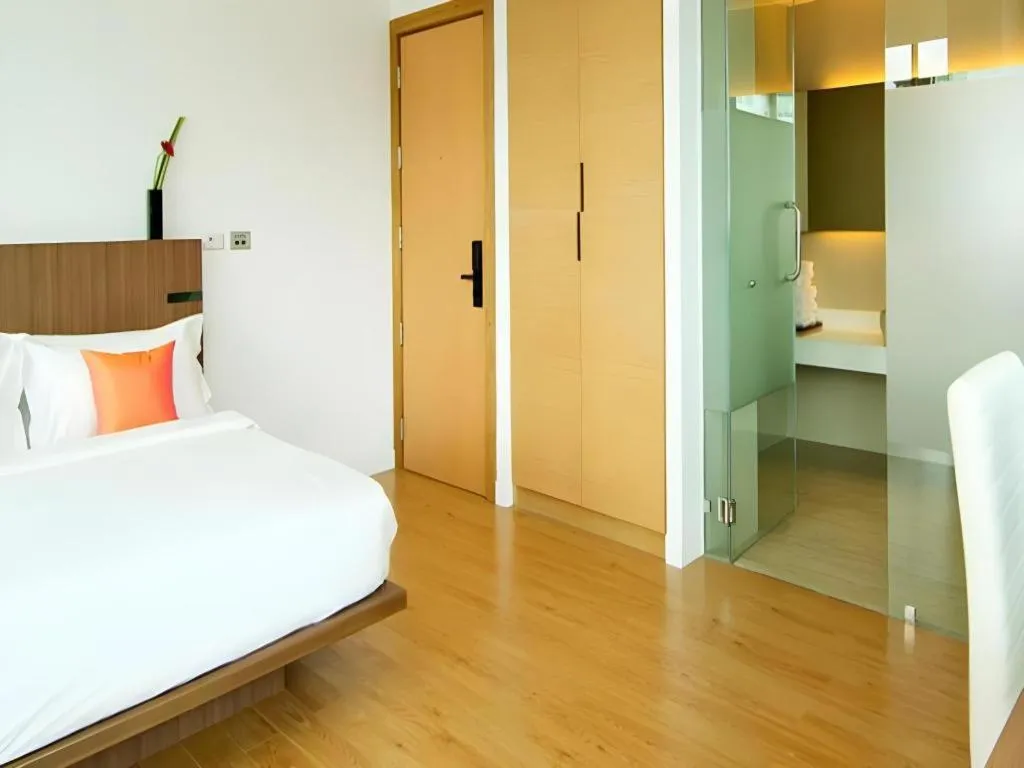 Bed in Seven Zea Chic Hotel