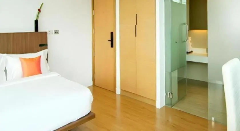 Bed in Seven Zea Chic Hotel