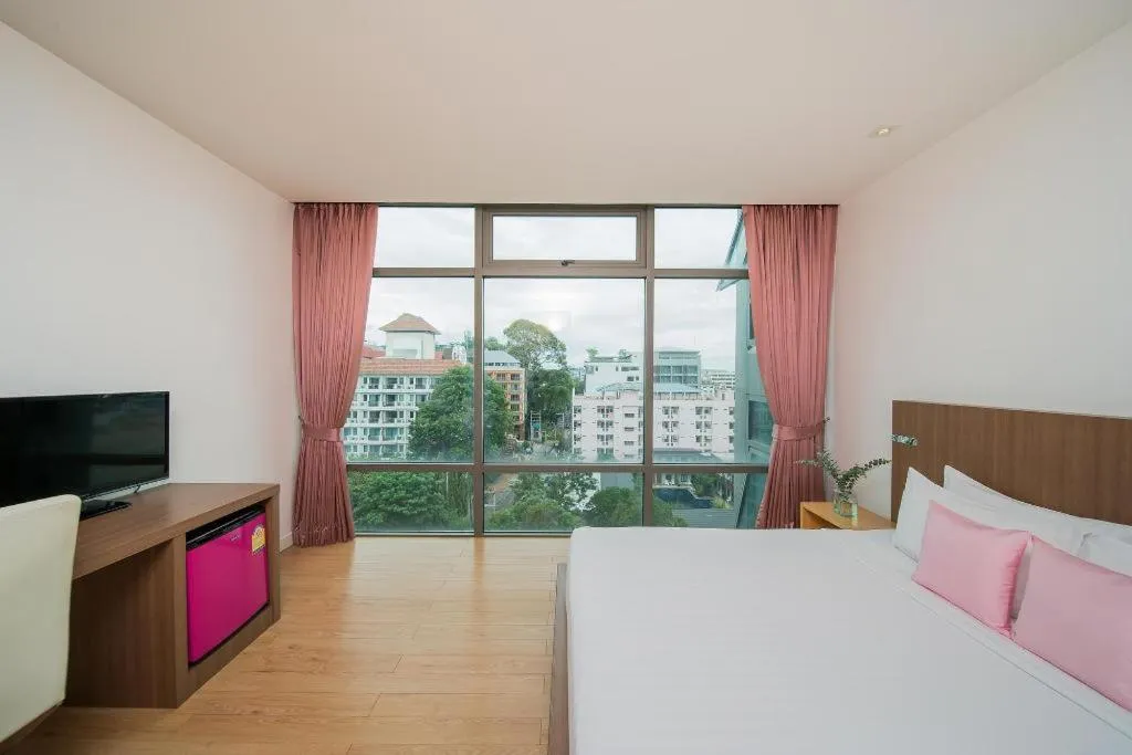 Bed in Seven Zea Chic Hotel