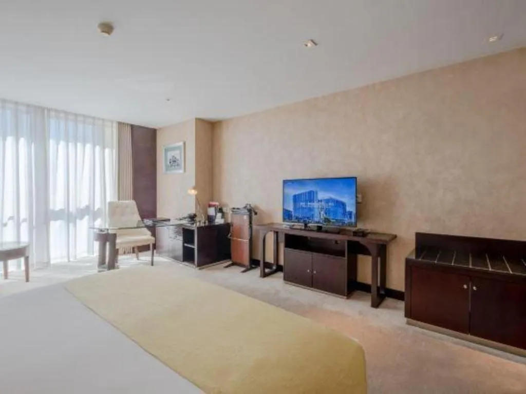 Bed in China National Convention Center Grand Hotel