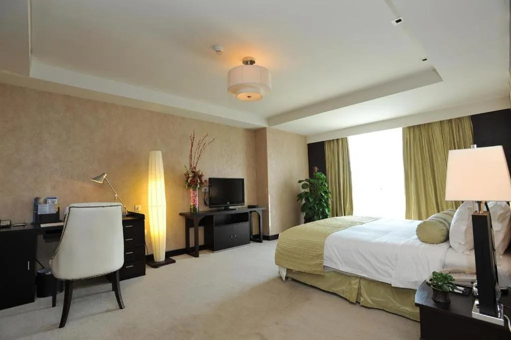 Bed in China National Convention Center Grand Hotel