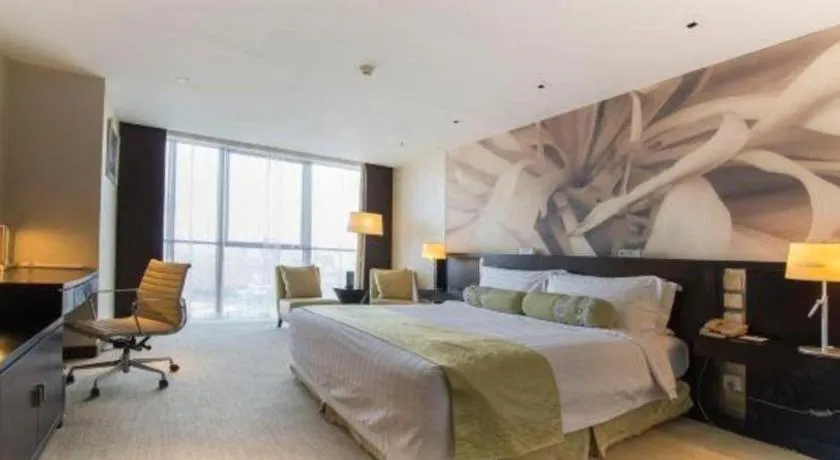 Bed in China National Convention Center Grand Hotel