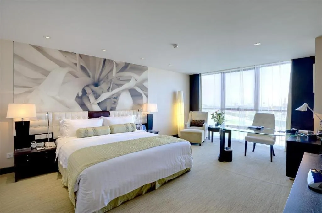 Bed in China National Convention Center Grand Hotel