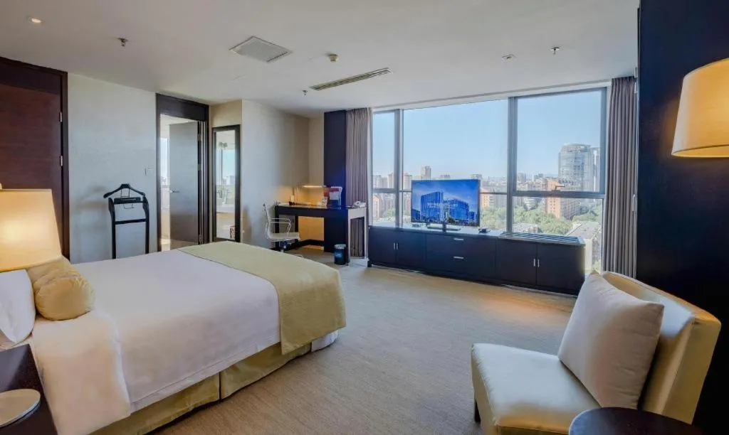 Bed in China National Convention Center Grand Hotel