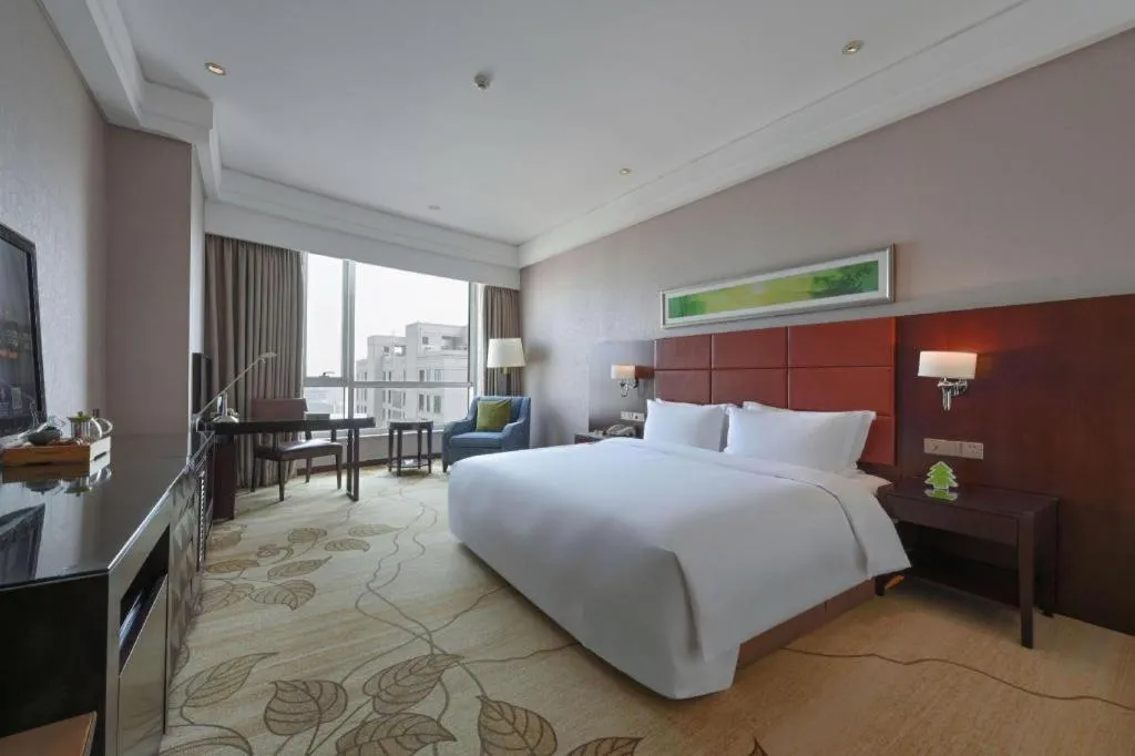 Bed in Kinho Narada Hotel